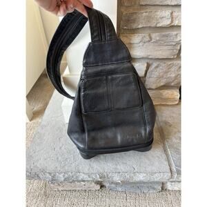 Tignanello Leather Sling Backpack Black Pocket Travel Minimal Festival